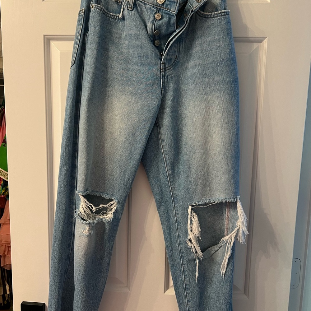 Distressed Light Blue Jeans